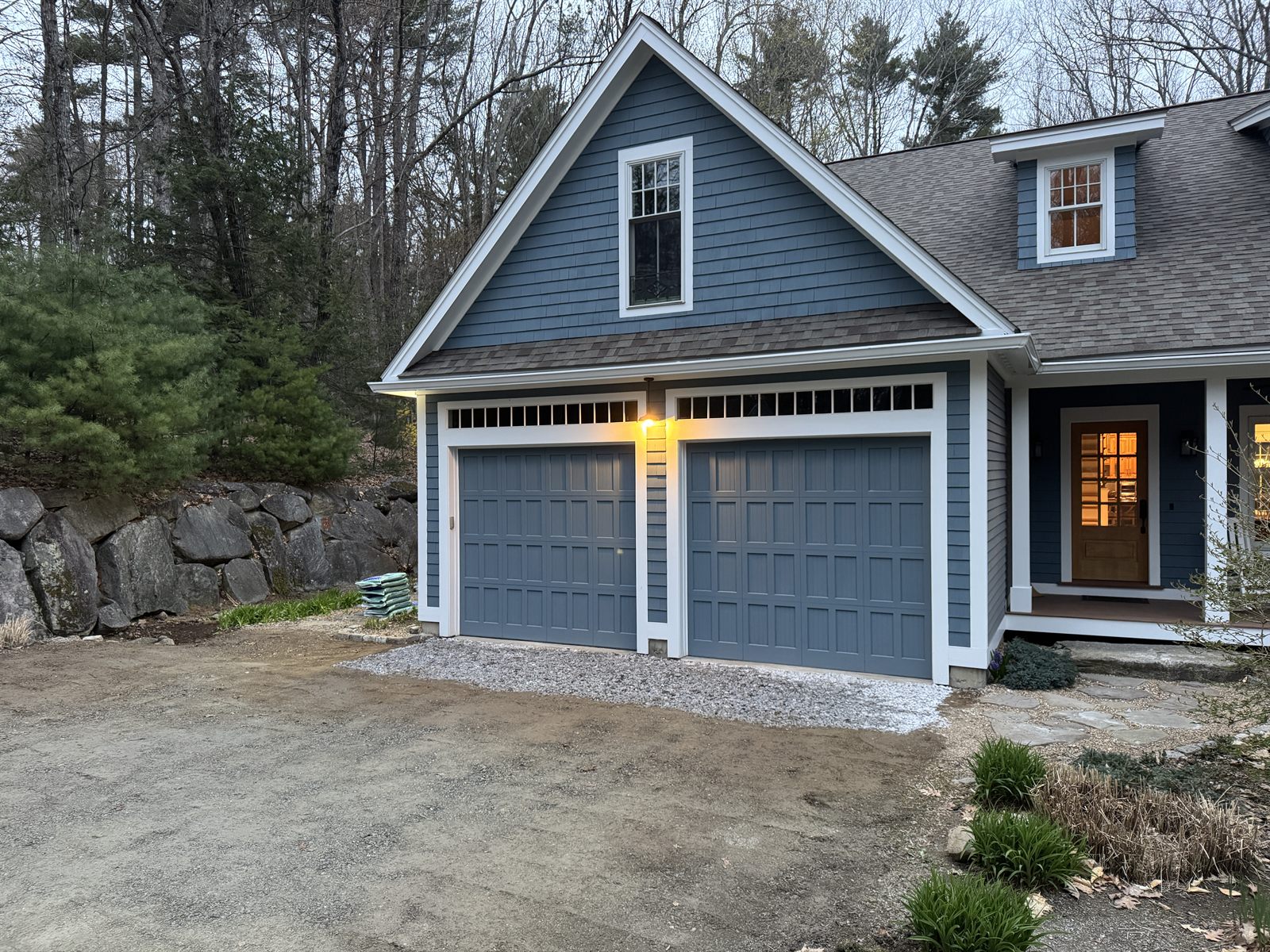 Finished graded gravel apron at the garage after drainage work — GSS New Hampshire