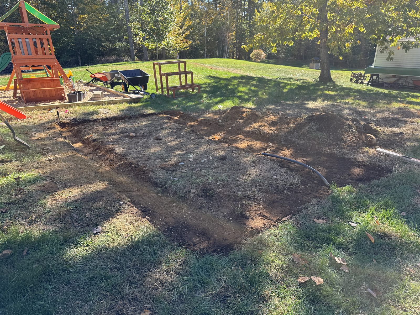 Bare excavated ground prepared for a greenhouse build — GSS, Newfields NH