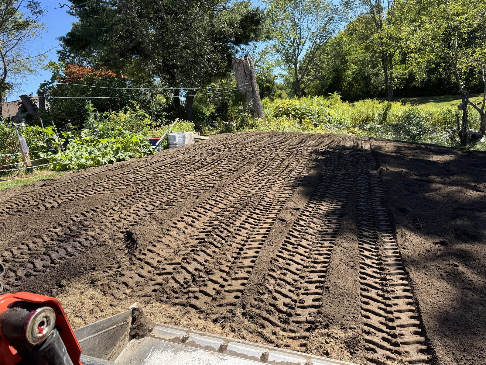 Freshly tilled and prepared soil for a lawn renovation — soil-first approach by GSS